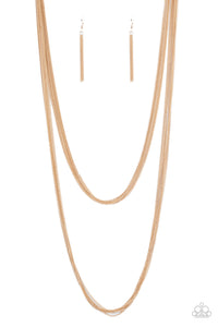 Row after row of dainty gold chains layer down the chest for a boldly tiered look. Features an adjustable clasp closure.