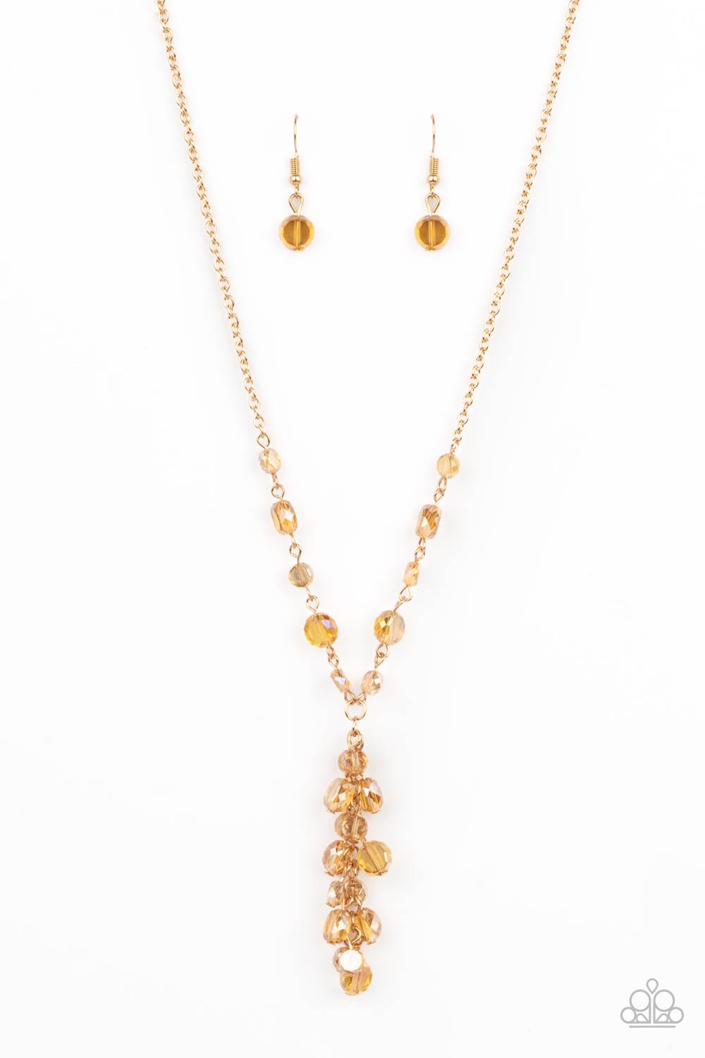 Dipped in a rainbow iridescence, a faceted collection of golden crystal-like beads delicately links below the collar. A tassel of matching beads cascades from the center, creating a stellar extended pendant. Features an adjustable clasp closure.