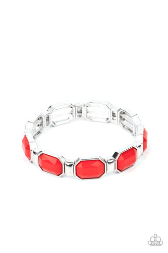 Encased in sleek silver fittings, faceted red beads join dainty silver rectangular frames along stretchy bands around the wrist for a dainty pop of color. 