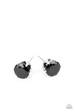 Load image into Gallery viewer, An oversized black rhinestone is nestled inside a pronged silver fitting, creating a timeless statement piece. Earring attaches to a standard post fitting.
