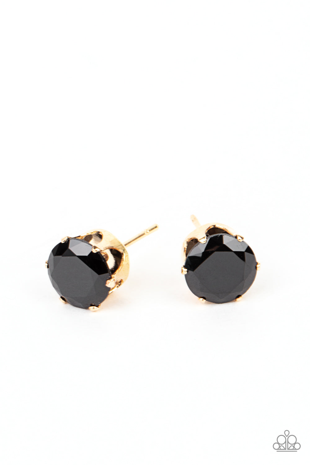 An oversized black rhinestone is nestled inside a pronged gold fitting, creating a timeless statement piece. Earring attaches to a standard post fitting.