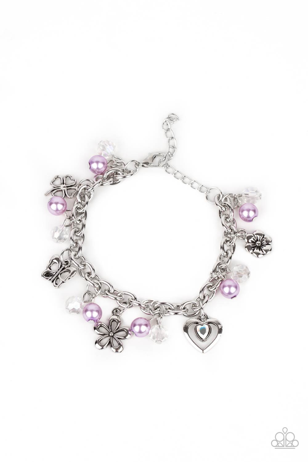 Infused with purple pearls and iridescent crystal-like beads, mismatched silver charms including a clover, butterfly, heart, and floral frames swing from a chunky silver chain around the wrist. Features an adjustable clasp closure.