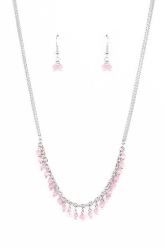 Dainty pink cat's eye stones dangle from a classic silver chain, creating a dewy fringe below the collar. Features an adjustable clasp closure. 