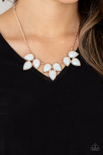 Load image into Gallery viewer, Trios of faceted iridescence, dewy white teardrop beads, encased in studded rose gold casings coalesce into leafy frames that delicate link into an ethereal fringe below the collar. Features an adjustable closure.
