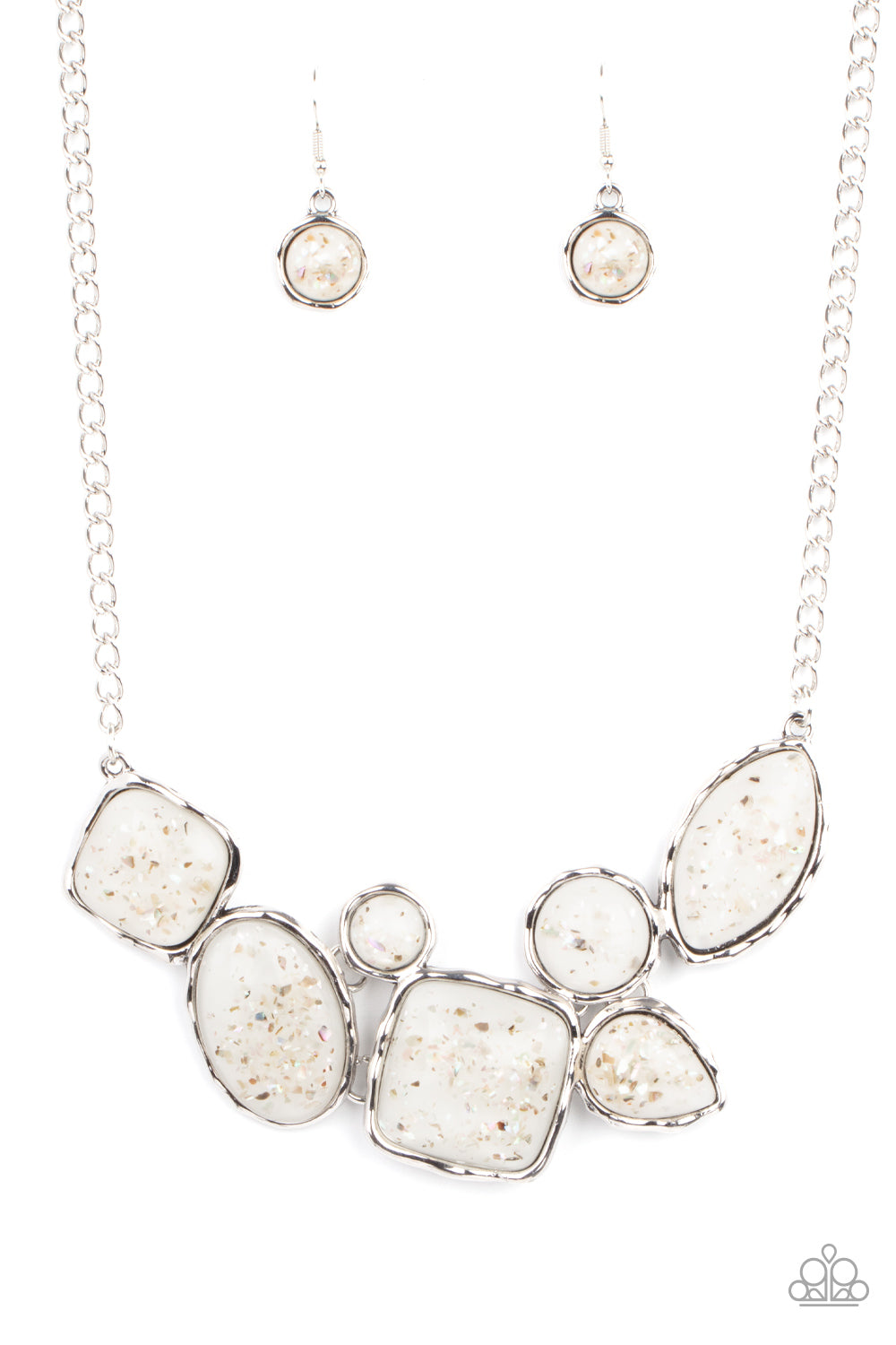 Flecks of iridescent shell-like pieces are encased in glassy white beads. Featuring hammered silver frames, the mismatched frames delicately cluster below the collar for an ethereal fashion. Features an adjustable clasp closure. 