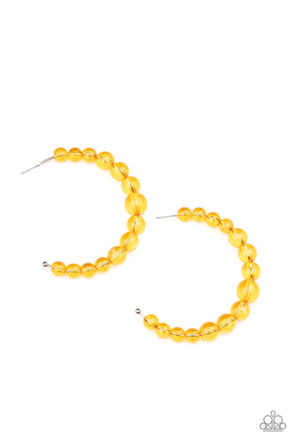 Gradually increasing in size at the center, a glassy collection of Marigold beads are threaded along an oversized hoop for a bubbly effect. Earring attaches to a stand post fitting. Hoop measures approximately 2 1/2