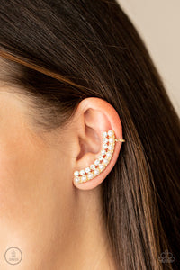 Featuring classic gold fittings, two rows of dainty white pearls and glassy white rhinestones arch into a timeless statement piece. Earring attaches to a standard post earring. Features a clip-on fitting at the top for a secure fit.