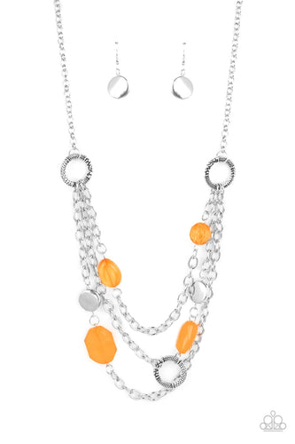 Varying in shape and opacity, glassy Marigold crystal-like beads, asymmetrical silver discs, and textured silver rings haphazardly adorn three silver chains below the collar for a whimsical pop of color. Features an adjustable clasp closure. 