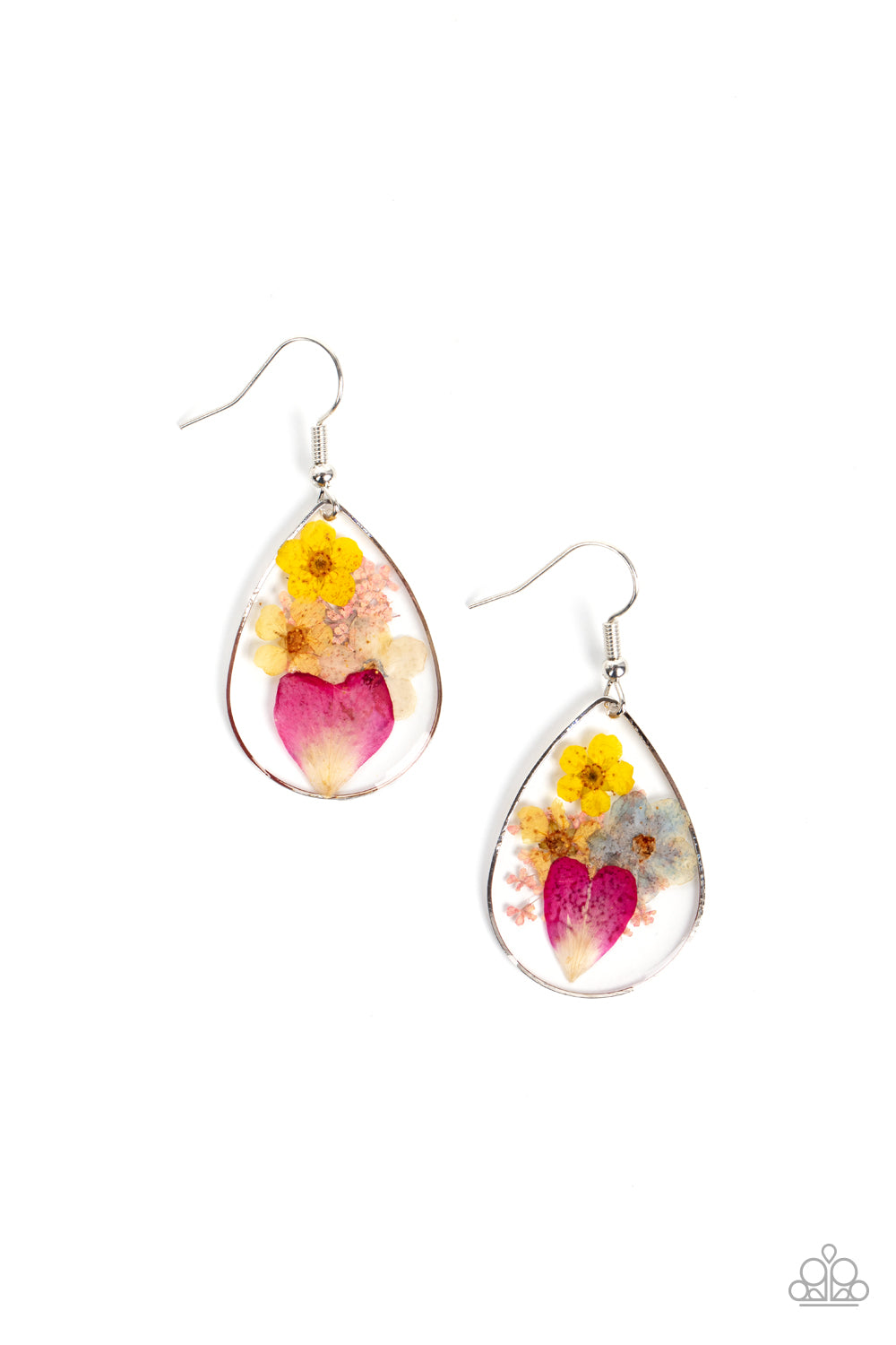 A colorful collection of wildflowers is encased inside a glassy teardrop casing bordered in silver, creating a whimsical display. Earring attaches to a standard fishhook fitting.