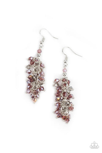 Threaded along dainty rods, an iridescent collection of smoky and purple crystal-like beads cluster along a silver chain, creating a stellar tassel. Earring attaches to a standard fishhook fitting.