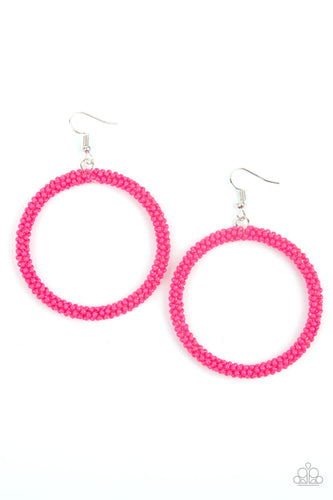 A dainty strand of vivacious pink seed beads wrap around a silver hoop, creating a bubbly hoop. Earring attaches to a standard fishhook fitting.