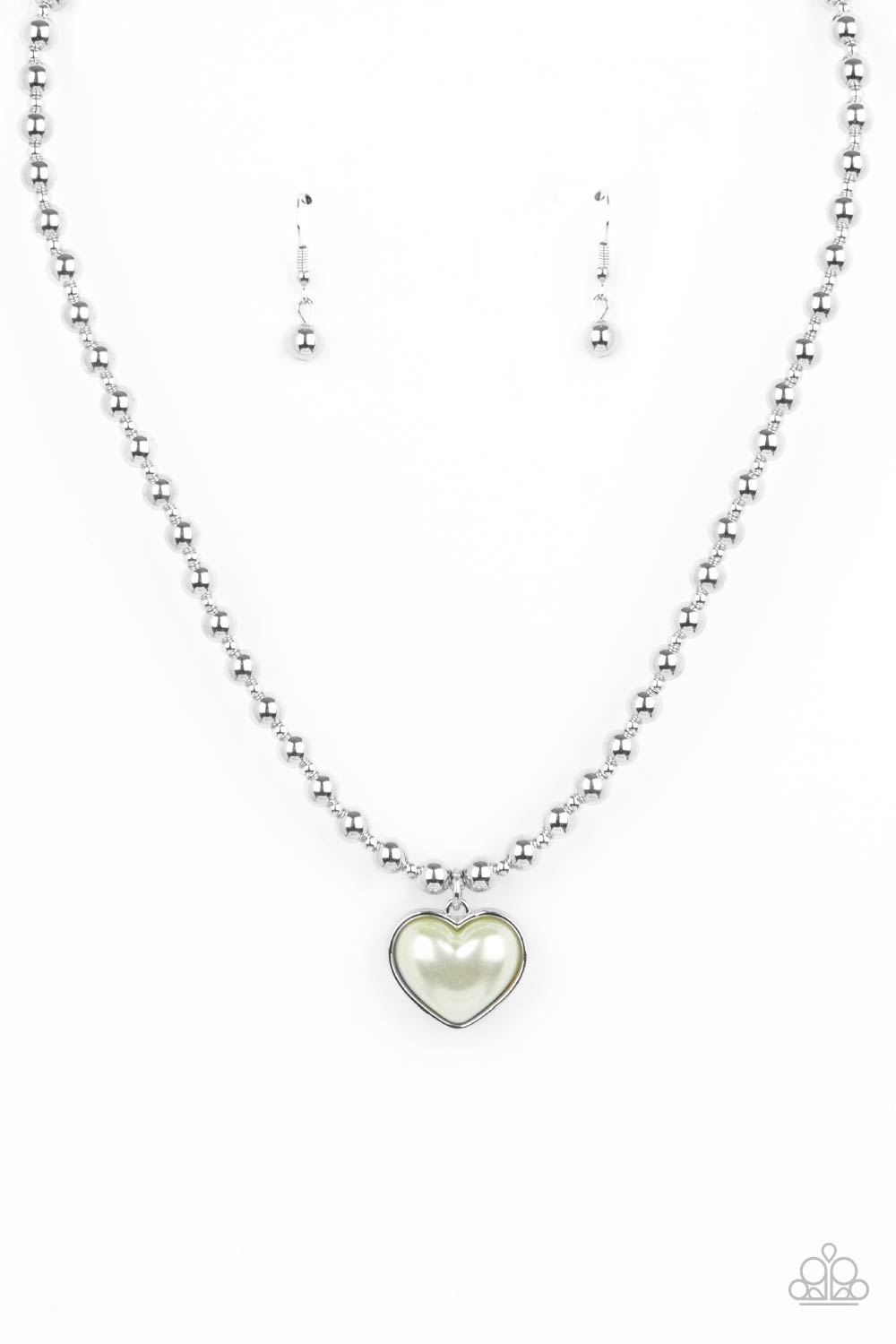 Featuring a pearly Green Ash center, a charming heart pendant glides along a strand of silver beads below the collar for a romantic flair. Features an adjustable clasp closure. 