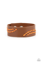 Load image into Gallery viewer, Marigold cording is stitched across the front of a brown leather band, creating curved patterns. Features an adjustable snap closure. 
