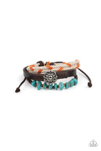 Load image into Gallery viewer, Featuring a silver floral centerpiece, mismatched strands of  turquoise stones and wooden beads, brown leather, and braided orange and white cording layers across the wrist for a seasonal flair. Features an adjustable sliding knot closure. 
