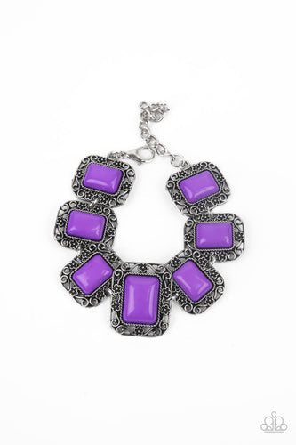 A flirty collection of Amethyst Orchid rectangular beads are bordered by rustic floral filigree filled frames as they delicately link around the wrist for a whimsical flair. Features an adjustable clasp closure.