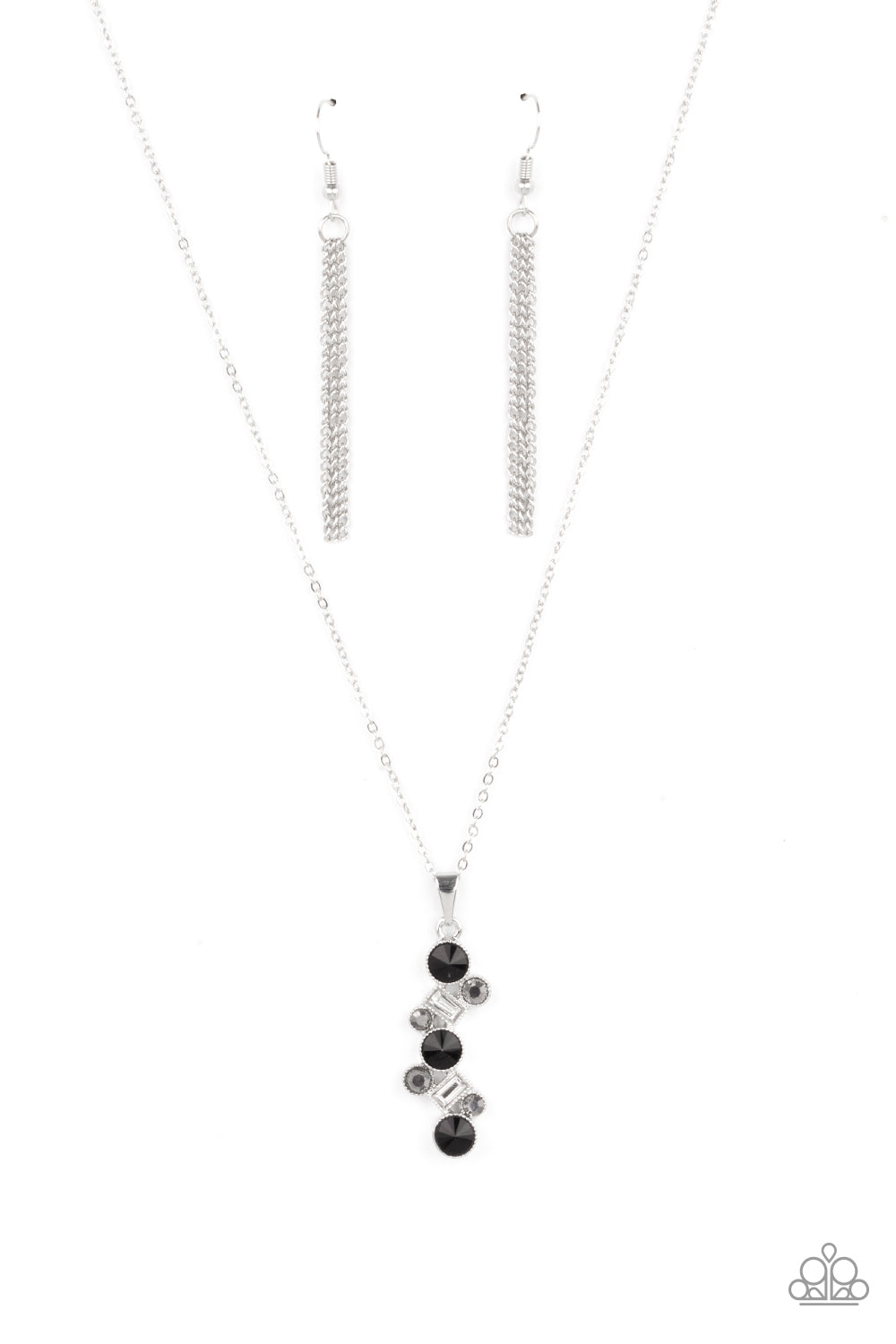 Featuring classic round and regal emerald style cuts, a glittery collection of black, hematite, and white rhinestones delicately coalesce into a glamorous pendant below the collar. Features an adjustable clasp closure.