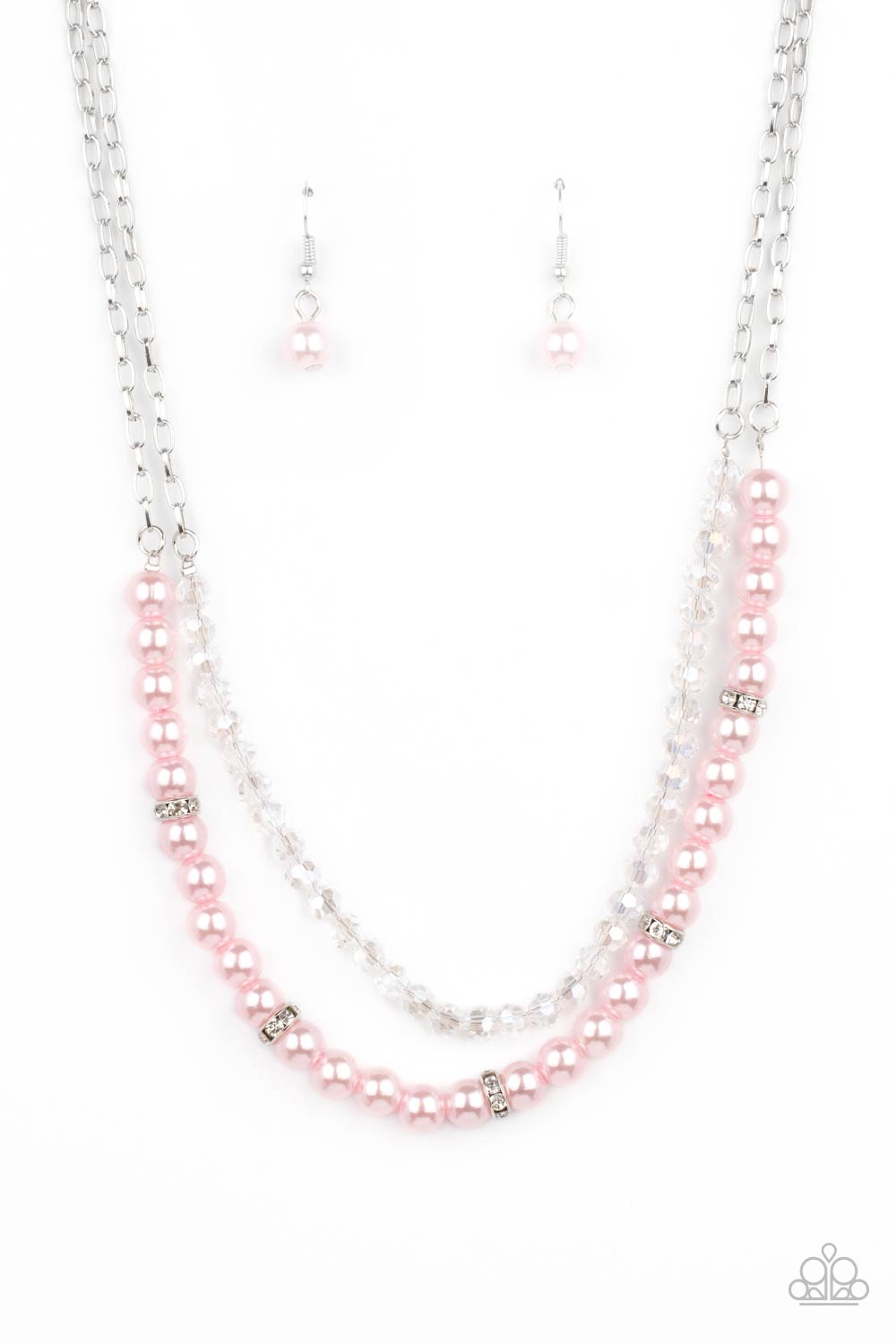 A strand of glassy white crystal-like beads and pearly pink beads and white rhinestone encrusted silver rings layer below the collar, creating a timeless display. Features an adjustable clasp closure.