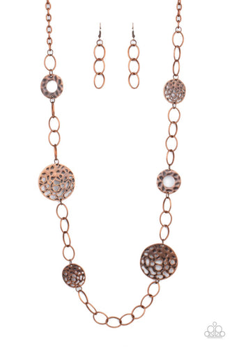 Featuring rustic finishes, hammered copper hoops and holey copper discs link with sections of oversized copper links across the chest for an artisan inspired look. Features an adjustable clasp closure. 