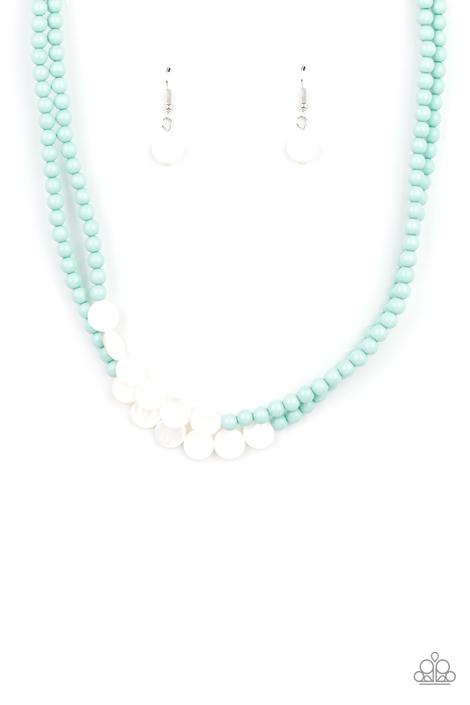 A summery collection of shiny white shell-like discs and dainty blue beads are threaded along invisible wire, creating colorful layers below the collar. Features an adjustable clasp closure.