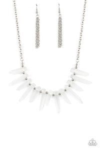 Separated by dainty silver beads, an opaque collection of glassy-like icicle beads fan out below the collar, creating an icy fringe. Features an adjustable clasp closure.