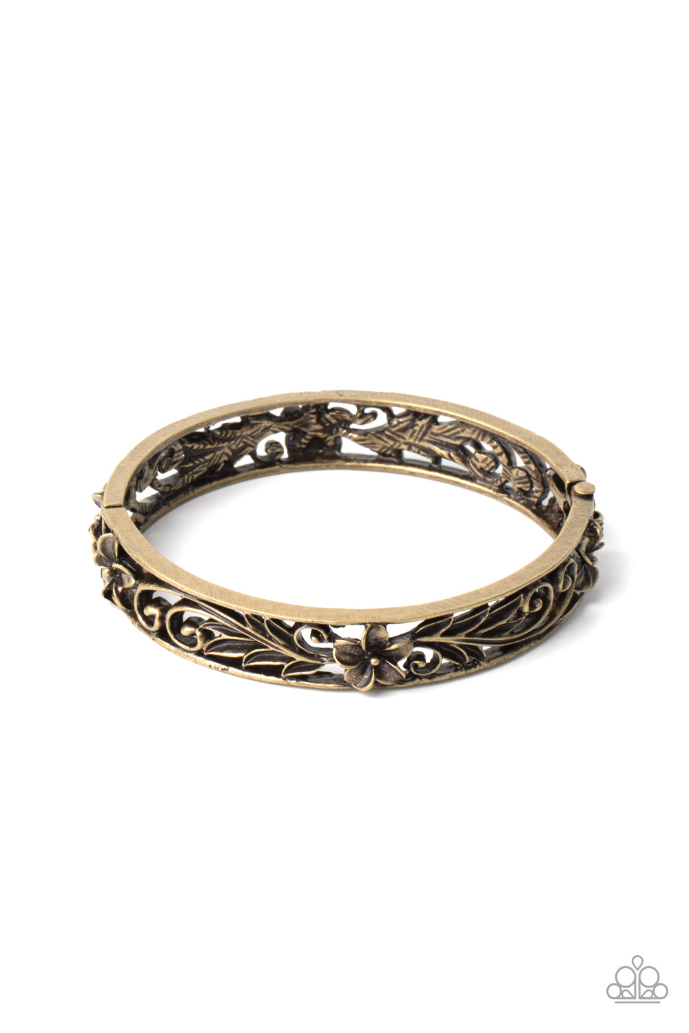 Filled with leafy tropical floral filigree, two antiqued brass frames connect into a whimsical bangle-like cuff around the wrist. Features a hinged closure.