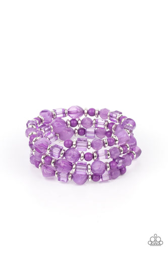 Featuring glassy, polished, and opaque finishes, a whimsical collection of Amethyst Orchid pebble, crystal, and acrylic beads are threaded along a dainty wire, creating a colorful infinity wrap bracelet around the wrist.