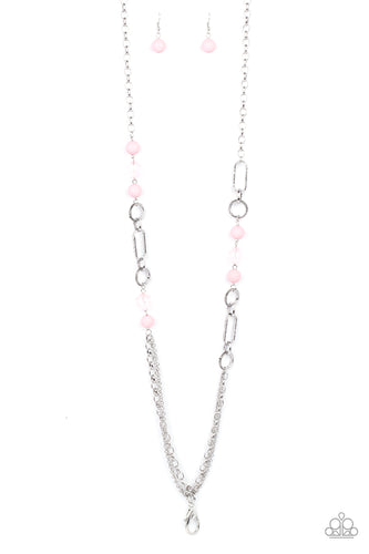 Soft rosy pink beads and transparent pink faceted beads playfully accent textured round and oval hoops midway down a large silver chain. A triple set of large and small linked chains creates a delightful finish. A lobster clasp hangs from the bottom of the design to allow a name badge or other item to be attached. Features an adjustable clasp closure.