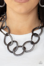 Load image into Gallery viewer, Surprisingly lightweight, enormous hematite links create an intimidating statement as they circle around the collar. The contoured, textured links have a distinctly industrial vibe that demands a second look. Features an adjustable clasp closure. 
