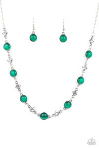 Encased in antiqued silver fittings, dainty white rhinestones and glowing Mint cat's eye stones delicately link below the collar for a timeless finish. Features an adjustable clasp closure. 