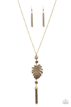 Load image into Gallery viewer, Infused with brass beaded accents, a lifelike brass palm leaf frame attaches to the bottom of a rustic brass chain. An antiqued brass chain tassel swings from the bottom, adding flirtatious movement to the summery statement piece. Features an adjustable clasp closure. 
