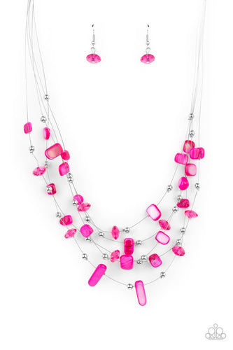 Dainty silver beads, pink crystal-like beads, and shell-like pink pebbles are fitted in place along strands of dainty wires, creating colorful layers below the collar. Features an adjustable clasp closure.