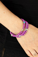 Load image into Gallery viewer, A collection of purple and turquoise stone beads, silver cube beads, and ornate silver accents are threaded along invisible bands around the wrist, creating vivacious layers. Features an adjustable clasp closure 
