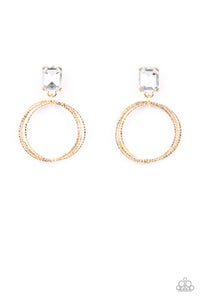 Encased in a pronged gold setting, a white emerald cut rhinestone links with a trio of refined textured gold rings, creating a romantic lure. Earring attaches to a standard post fitting. 