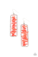 Load image into Gallery viewer, Bits of linear red rock are threaded along a metal rod inside a hammered silver rectangle, creating an earthy frame. Earring attaches to a standard fishhook fitting.
