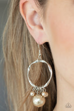 Load image into Gallery viewer, An oversized brown pearl joins dainty brown pearls along a twisted silver hoop, creating a bubbly fringe. Earring attaches to a standard fishhook fitting
