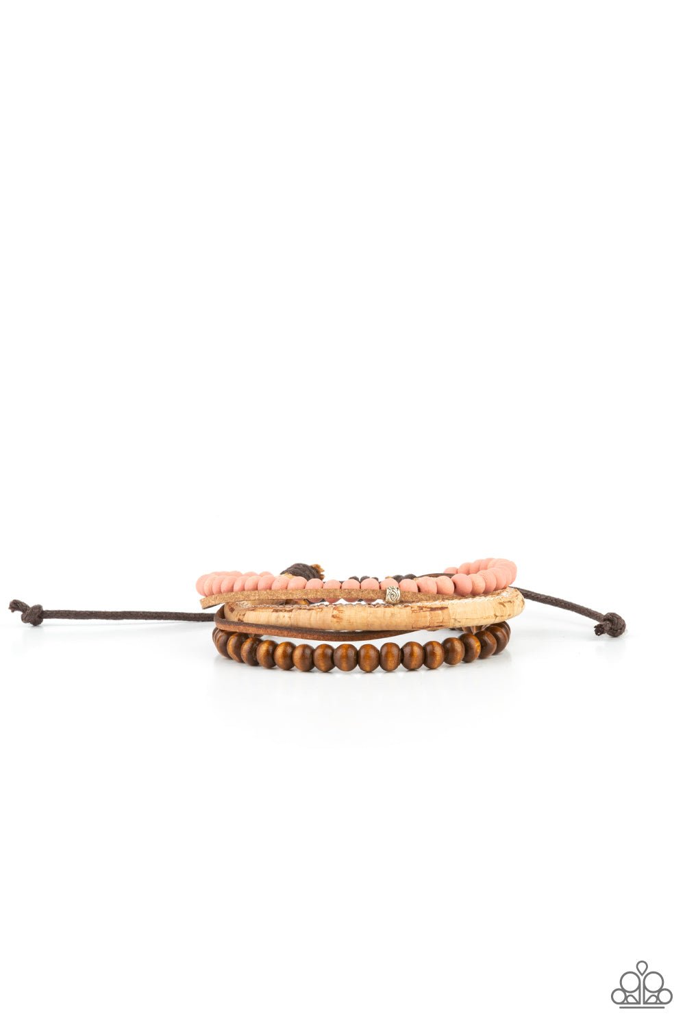 Featuring a strand of pink wooden beads, a collection of earthy strands of cork, leather, and wood, comes together for a simple handmade feel as it stacks up the wrist. Features an adjustable sliding knot closure.