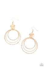 Load image into Gallery viewer, A shimmery wavy gold disc links atop a collection of three delicately hammered gold rings in concentric sizes for an out-of-this-world finish. Earring attaches to a standard fishhook fitting.
