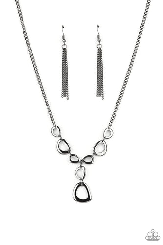 Irregular shaped gunmetal rings connect to a gunmetal chain as they make their way across the collar. Two rings dangle from the center for a stylish avant-garde fashion. Features an adjustable clasp closure. 