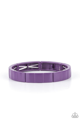 Metal rectangles painted in the spring Pantone® of Amethyst Orchid are threaded along stretchy bands, forming a gorgeous pop of color that wraps around the wrist.