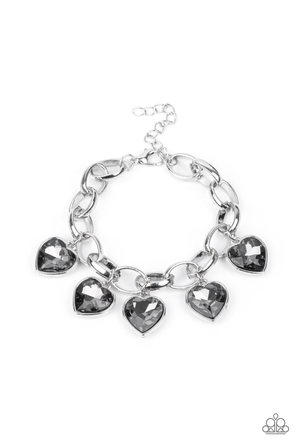 Smoky heart-shaped gems are encased in sleek silver frames that swing from an oversized silver chain, creating a sparkly fringe around the wrist. Features an adjustable clasp closure.