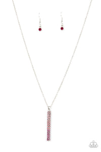 A sparkly collection of spectrum pink rhinestones are encrusted along a silver pendulum that swings along the bottom of a silver chain, creating a glittery ombre effect. Features an adjustable clasp closure.