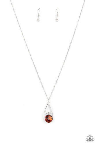 Two silver teardrops delicately overlap in a solitaire pendant at the bottom of a shiny silver chain. A dainty white rhinestone dots the bottom of the highest teardrop, while an oversized topaz gem adorns the lowermost teardrop, coalescing into a sparkly centerpiece. Features an adjustable clasp closure.