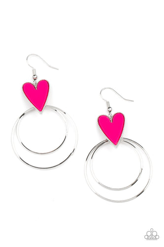 Dainty silver hoops attach to the bottom of a playful Raspberry Sorbet heart frame, creating a flirtatious pop of color. Earring attaches to a standard fishhook fitting