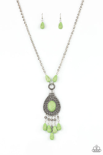 An Apple Green oval stone sits center stage surrounded by swirly designs stamped into a wide silver frame. A fringe of silver floral beads culminating in Apple Green stones swings like a pendulum at the end of a lengthened silver chain for a fashionable finish. Features an adjustable clasp closure.