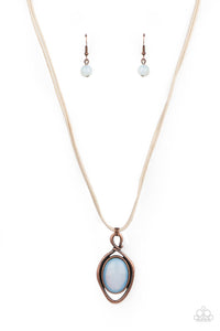 An oversized moonstone is pressed into a copper oval frame, outlined with an unexpected irregular shaped frame. The eye-catching pendant suspends from a double strand of natural cord below the collar for a mysterious finish. Features an adjustable clasp closure.