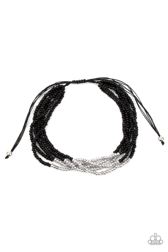 Four strands of black micro beads are accented with a bold section of silver beads for a simple yet trendy look. Features an adjustable sliding knot closure. 