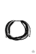 Load image into Gallery viewer, A single accent strand of silver beads merges with multiple strands of micro black beads for a simple yet trendy look. Features an adjustable sliding knot closure.
