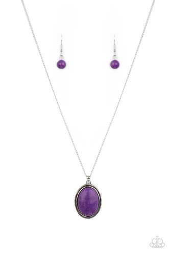 An oval Amethyst Orchid stone is pressed into the center of a studded silver frame, creating a tranquil pendant below the collar. Features an adjustable clasp closure.