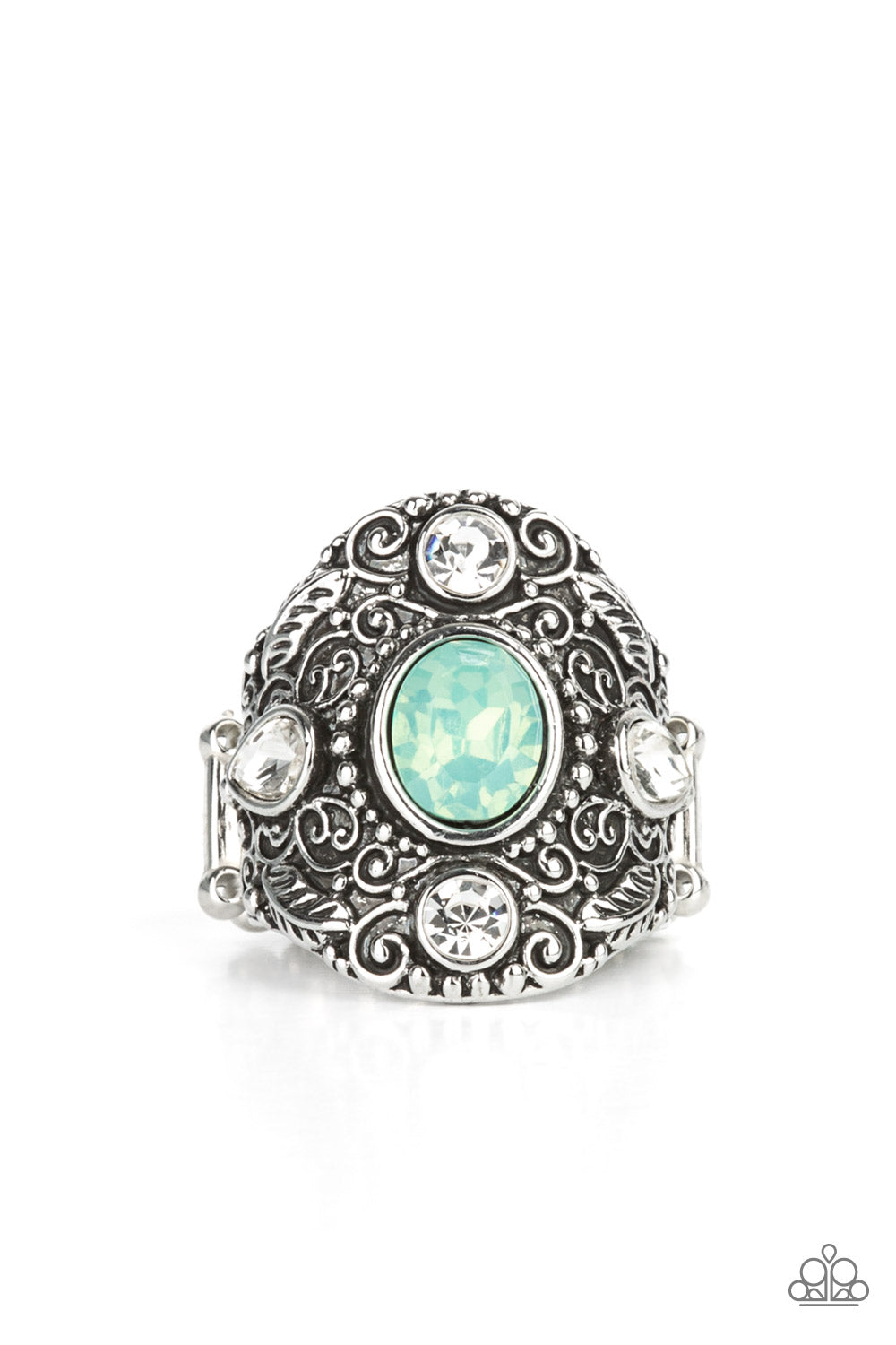 A dewy green gem adorns the center of an oversized antiqued frame embossed in silver leafy vine-like filigree. Round and teardrop white rhinestones adorn the four points of the frame, adding a classic sparkle to the ethereal centerpiece. Features a stretchy band for a flexible fit.