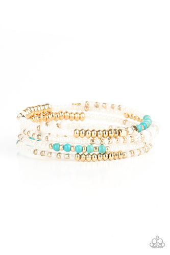 Sections of pearly white seed beads alternate with gold, turquoise, and crystal-like beads in infinite rows. The dreamy colors are threaded along a continuous strand of wire for an infinity wrap-style bracelet around the wrist